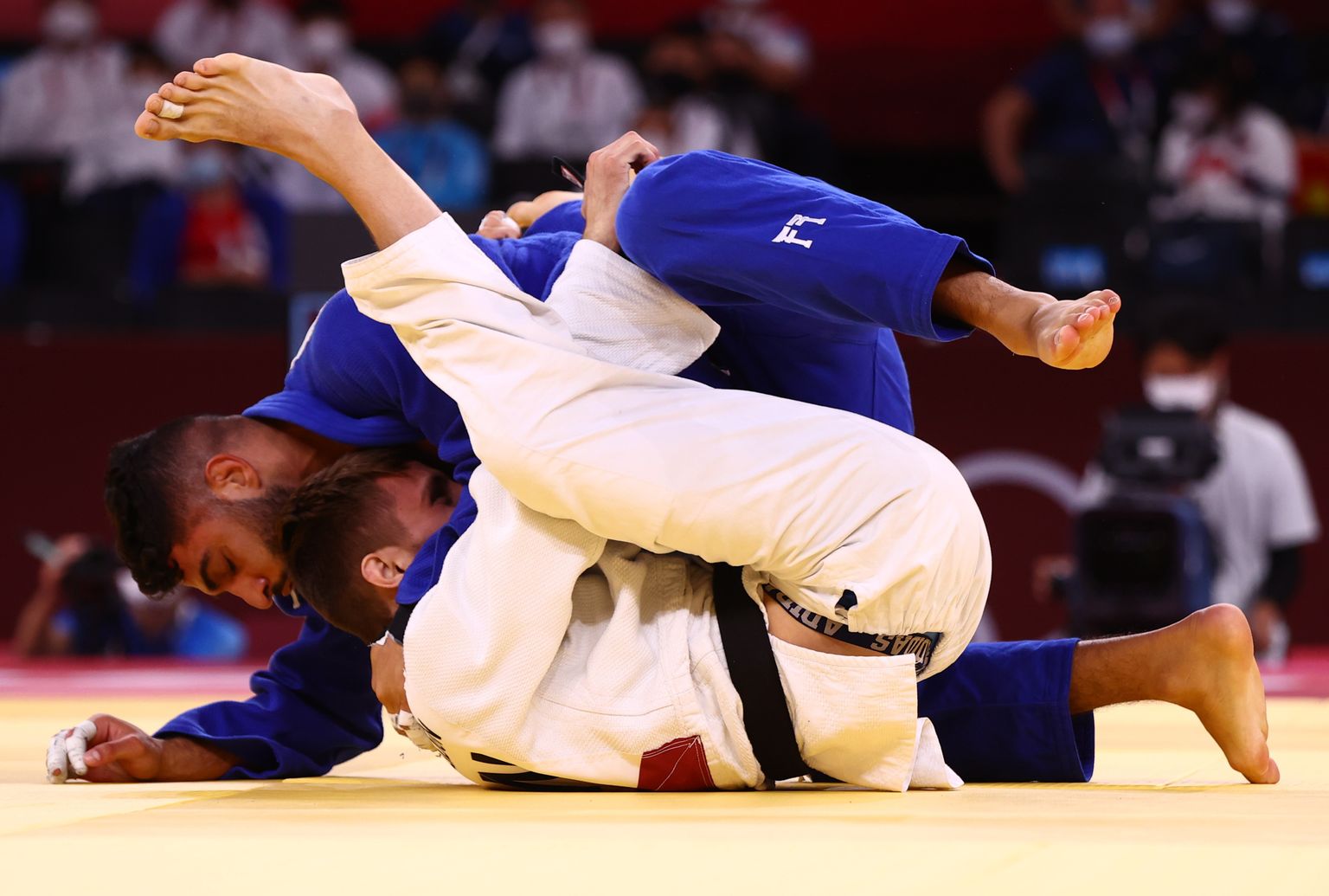 Judokad Tokyo olümpial. Sinises iisraellane Tohar Butbul, kes võitis olümpial pronksmedali segavõistkonna võistluses.