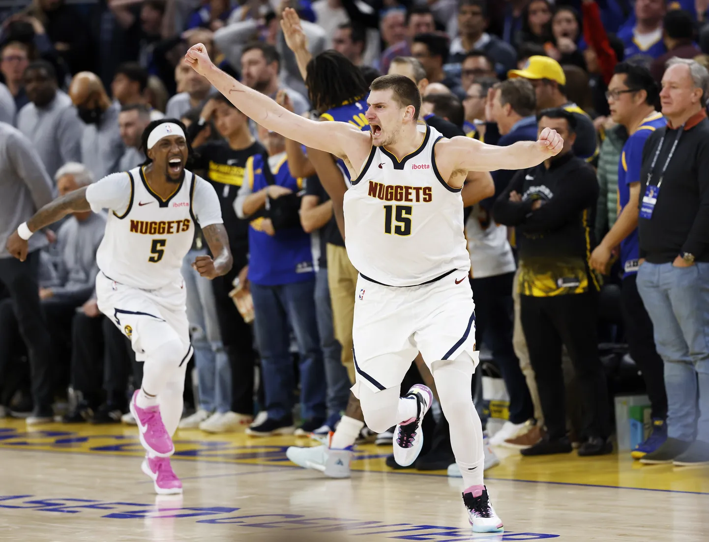 Nikola Jokic (15).