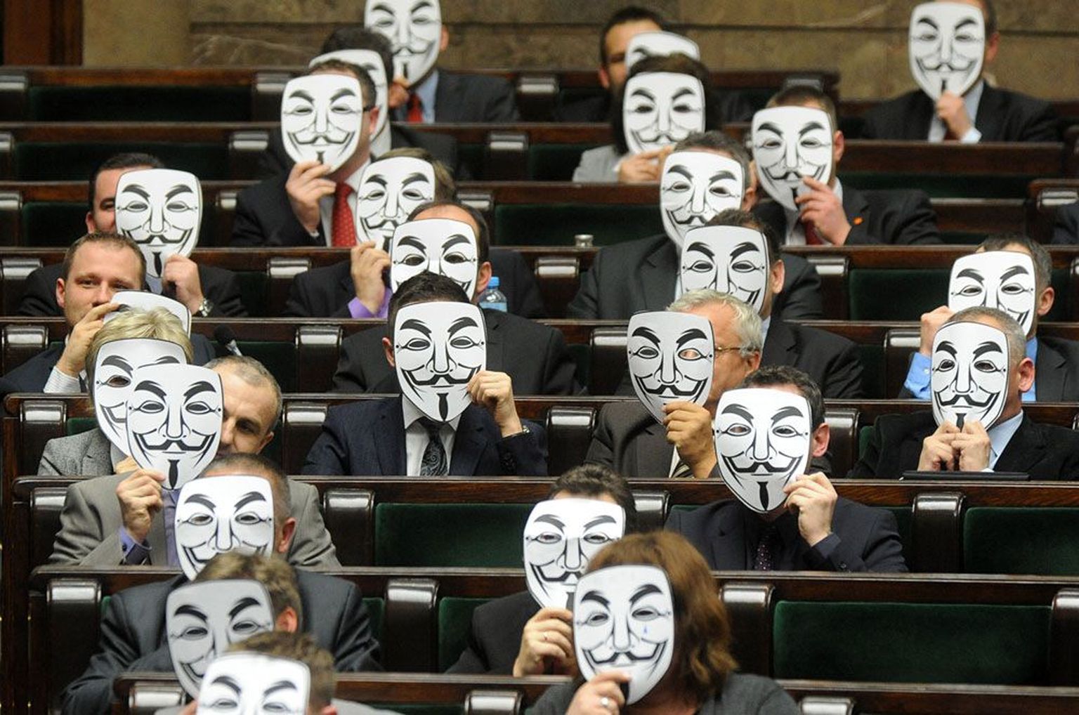 Palikoti Liikumise esindajad protsestimas ACTA vastu Poola parlamendis 2012. aastal.