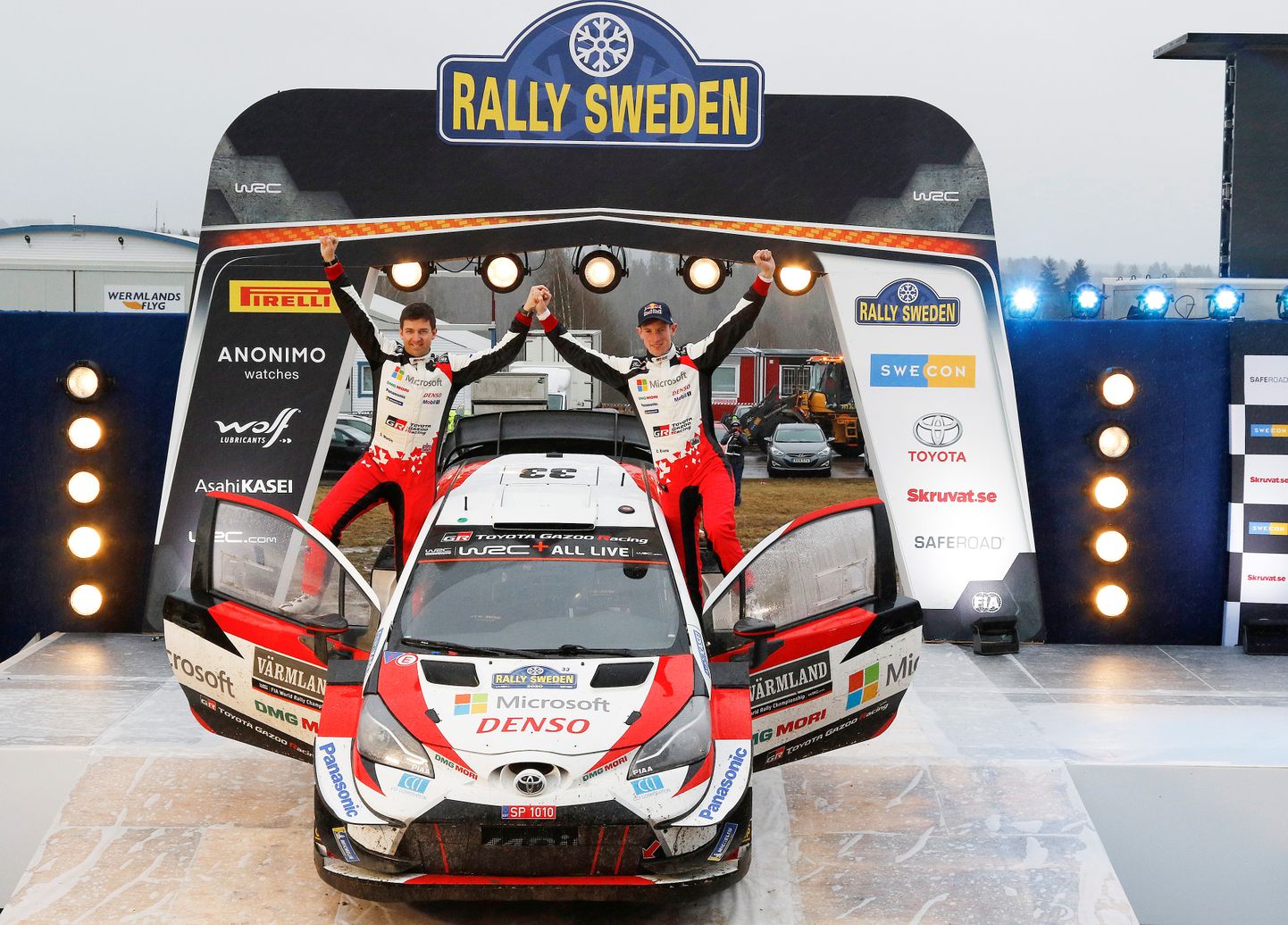 FIA World Rally Championship - Rally Sweden - Second Round - Torsby, Sweden - February 16, 2020. Elfyn Evans and co-driver Martin Scott of Britain celebrate at the podium. Micke Fransson/TT News Agency/via REUTERS      ATTENTION EDITORS - THIS IMAGE WAS PROVIDED BY A THIRD PARTY. SWEDEN OUT. NO COMMERCIAL OR EDITORIAL SALES IN SWEDEN.