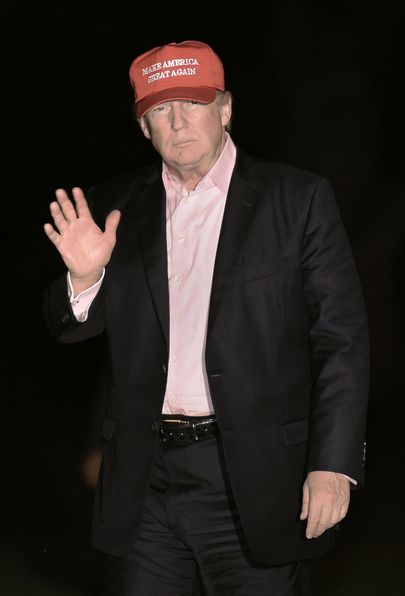 USA president Donald Trump oma kampaaniamütsi kandmas. Foto: Olivier Douliery /Capital Pictures / Scanpix