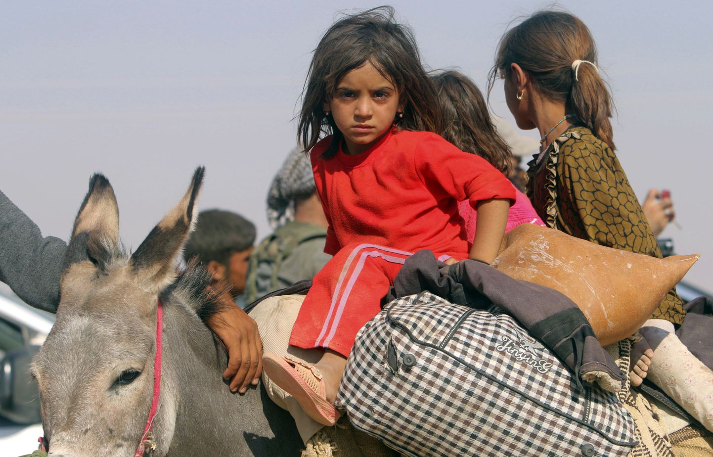 Pered põgenevad koos lastega Põhja-Iraagis tegutsevate pühasõdalaste eest.