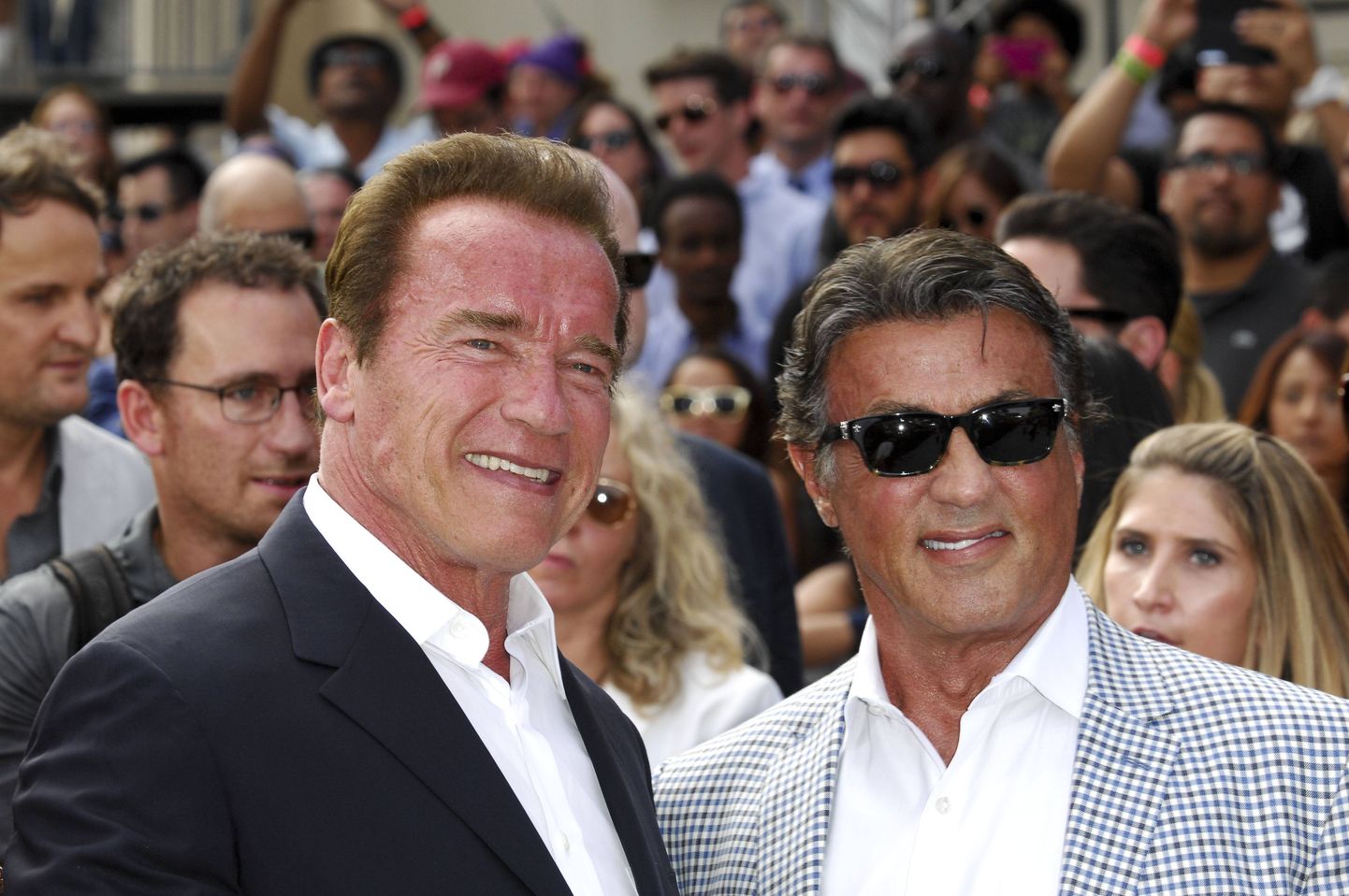 Arnold Schwarzenegger & Sylvester Stallone.