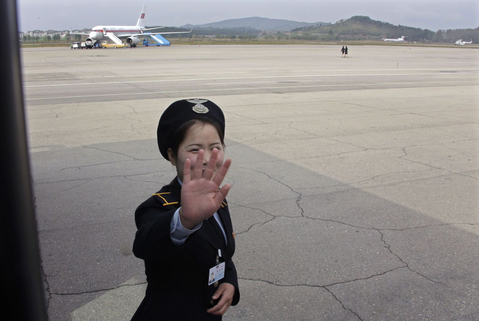 Pyongyangi lennujaam ja lennufirma Air Koryo töötaja.