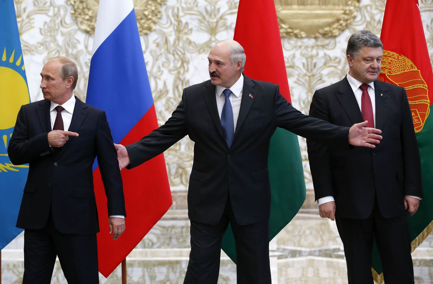 Venemaa president Vladimi Putin (vasakult), valgevene president Aleksandr Lukašenka ja Ukraina president Petro Porošenko Minskis.