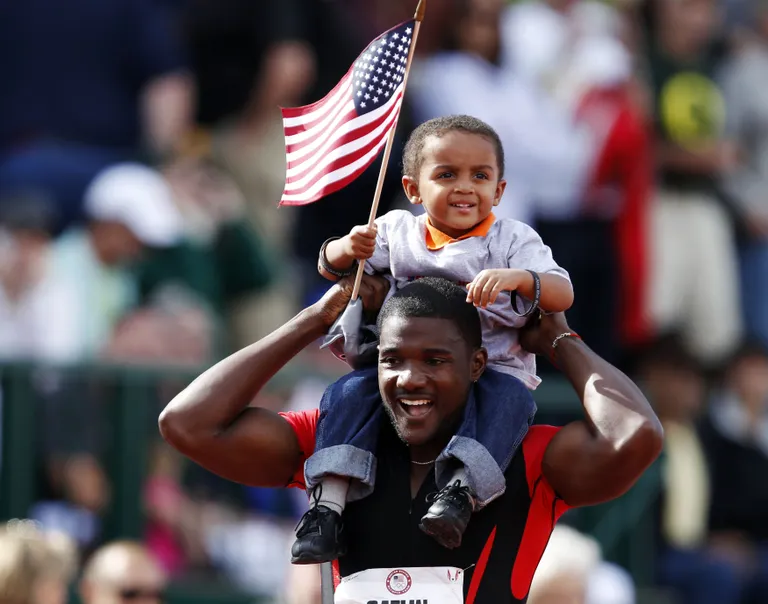 Justin Gatlin ja ta poeg Jace 2012. aastal. Jace on nüüdseks kuueaastane
