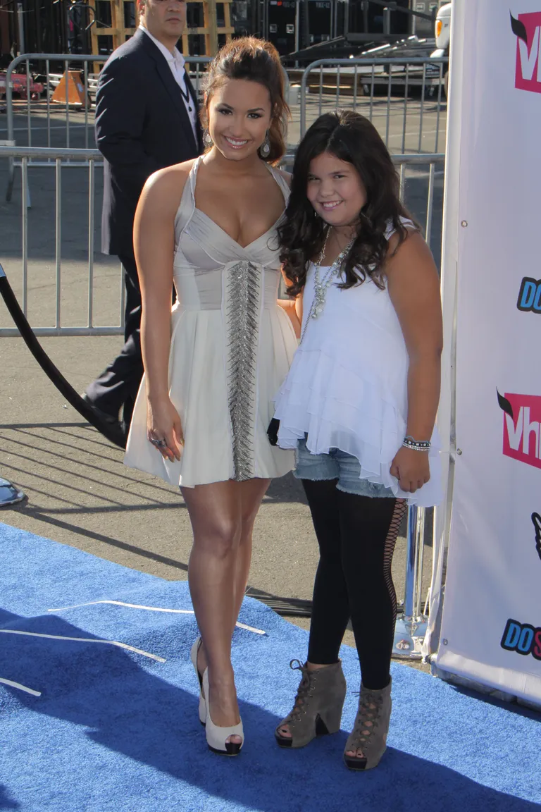 Õed Demi Lovato ja Madison De La Garza. 2011.