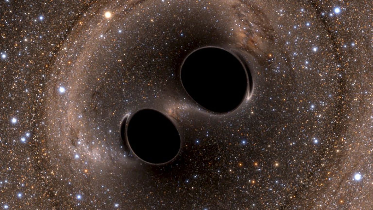 Kunstniku kujutis mustade aukude kokkupõrkest. Tegemist on ülisuure energiaga kosmilise sündmusega, mille tagajärjel tekivad Maalt registreeritavad gravitatsioonilained.