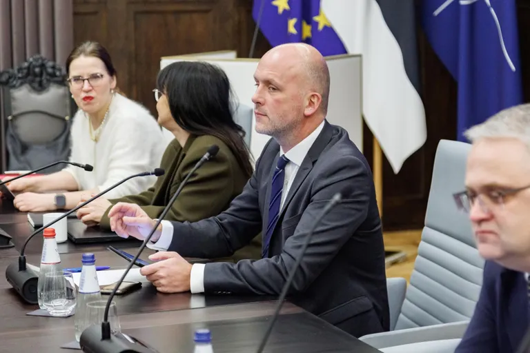 During the tenure of Taimar Peterkop (center), the secretary of state became the nation's crisis commander. Peterkop's experience in military service and background in the Ministry of Defense helped him assume this role.