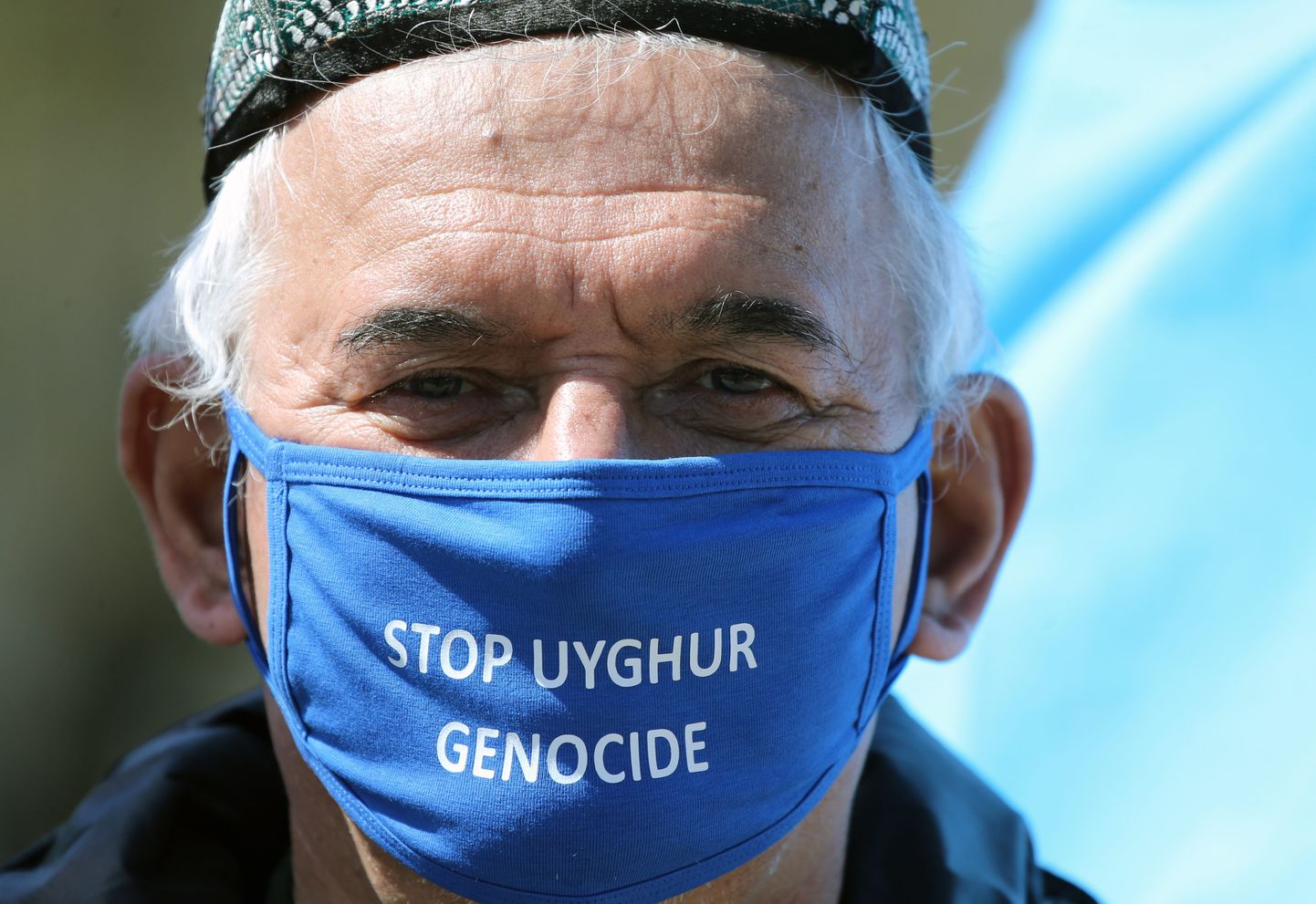 Uiguurimeelne protestija. Foto on illustreeriv.