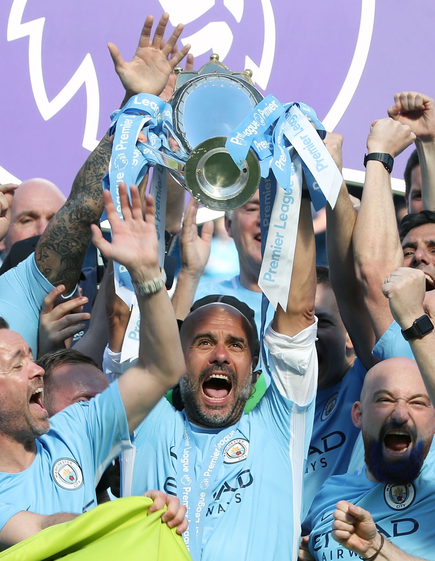 File photo dated 06-05-2018 of Manchester City manager Pep Guardiola lifts the Premier League trophy after the Premier League match at the Etihad Stadium, Manchester.