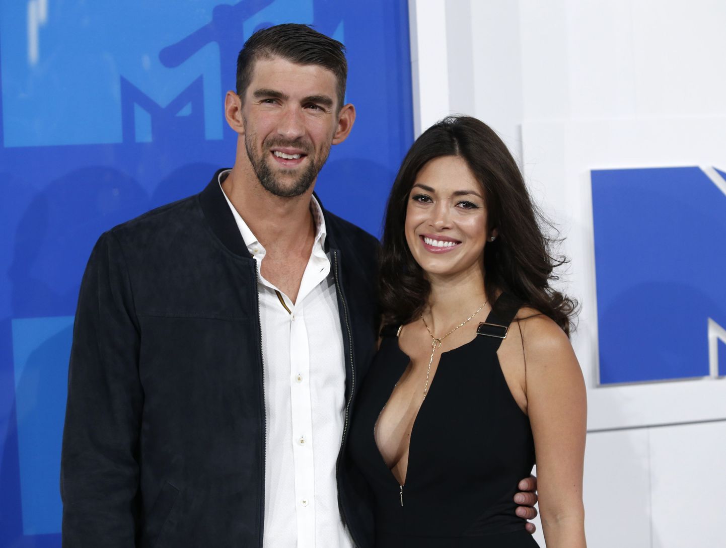 Michael Phelps koos abikaasa Nicole Johnsoniga.