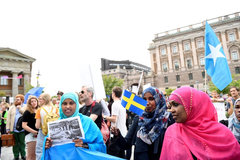 Immigrandid Rootsi parlamenti ees meeleavaldusel.