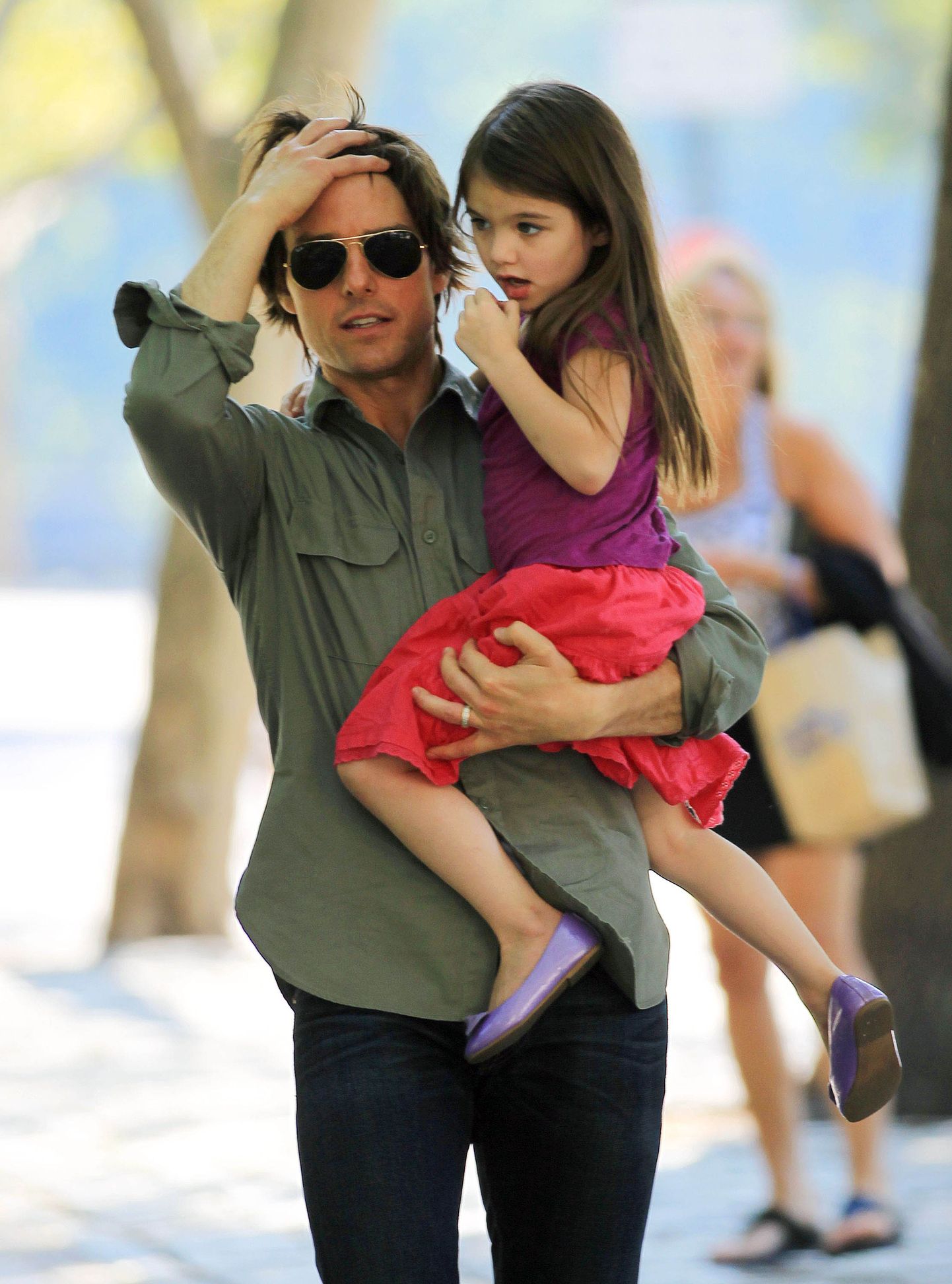 Tom Cruise tütre Suriga 2010. aastal.