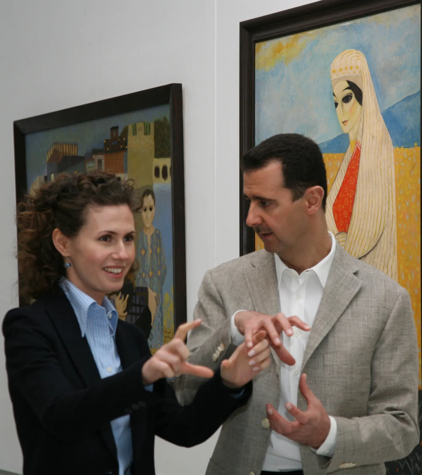 Süüria nüüdseks võimult tõugatud president Bashar al-Assad ja ta naine Asma al-Assad 23. veebruaril 2008 Damaskuses rahvusmuuseumis uue näituse avamisel.