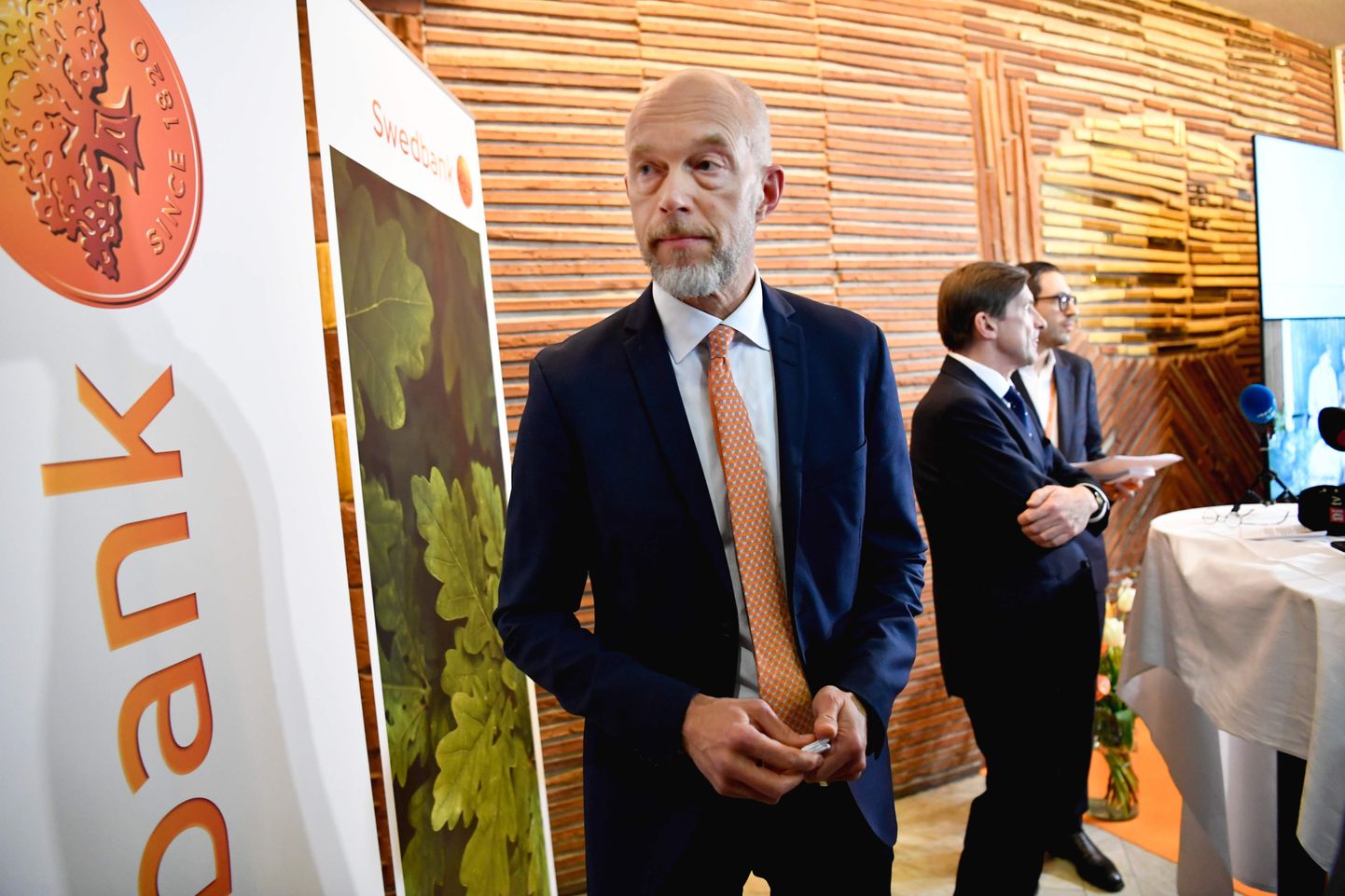 Swedbank's acting CEO Anders Karlsson attends a press conference as part of Swedbank's Annual General Meeting on March 28, 2019 in Stokholm. - Swedbank, in the focus of investigators in connection with a larger money laundering scandal, has fired its CEO Birgitte Bonnesen on March 28, 2019. (Photo by Henrik MONTGOMERY / TT News Agency / AFP) / Sweden OUT