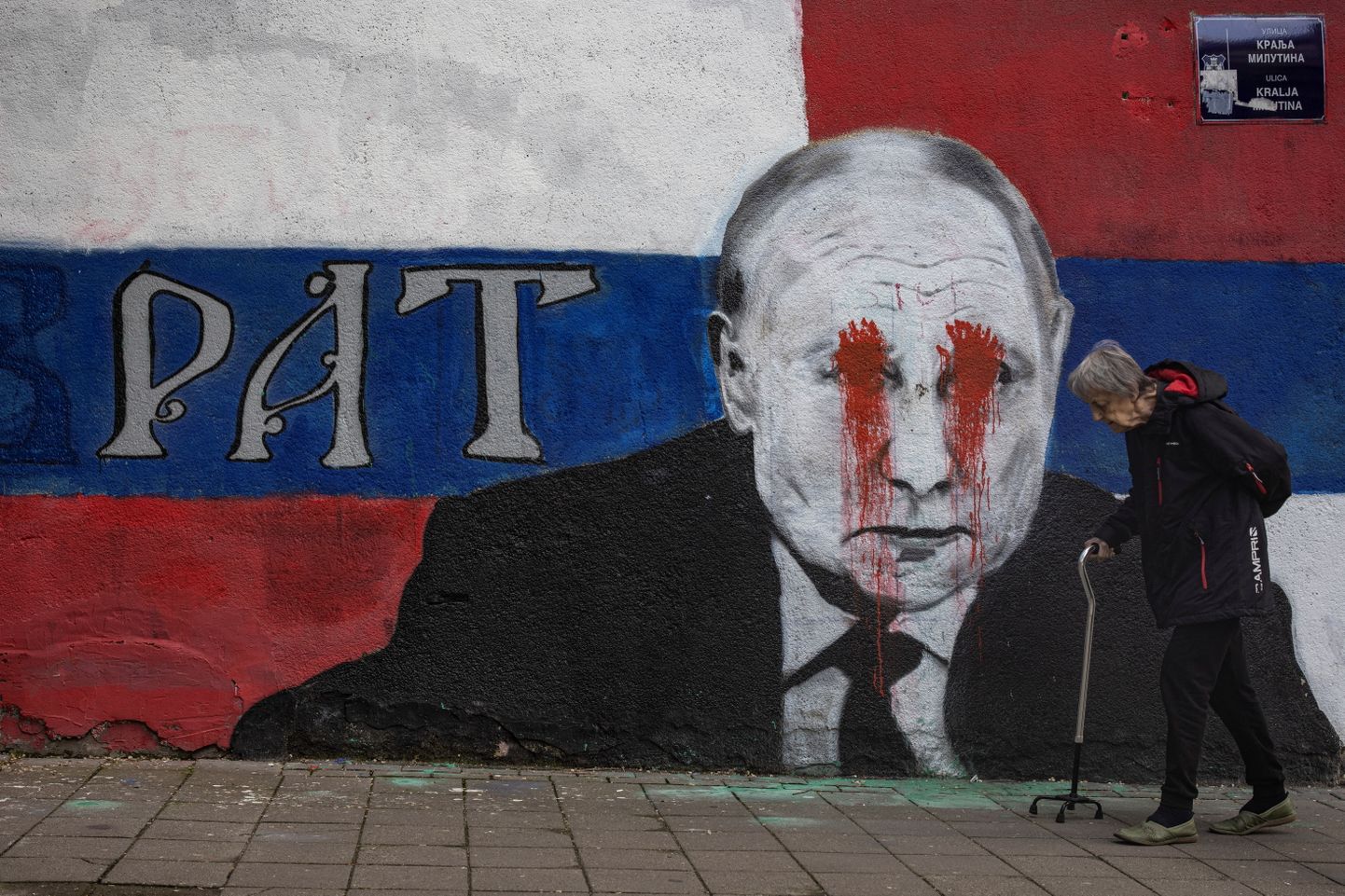 Граффити с изображением Владимира Путина в Белграде.