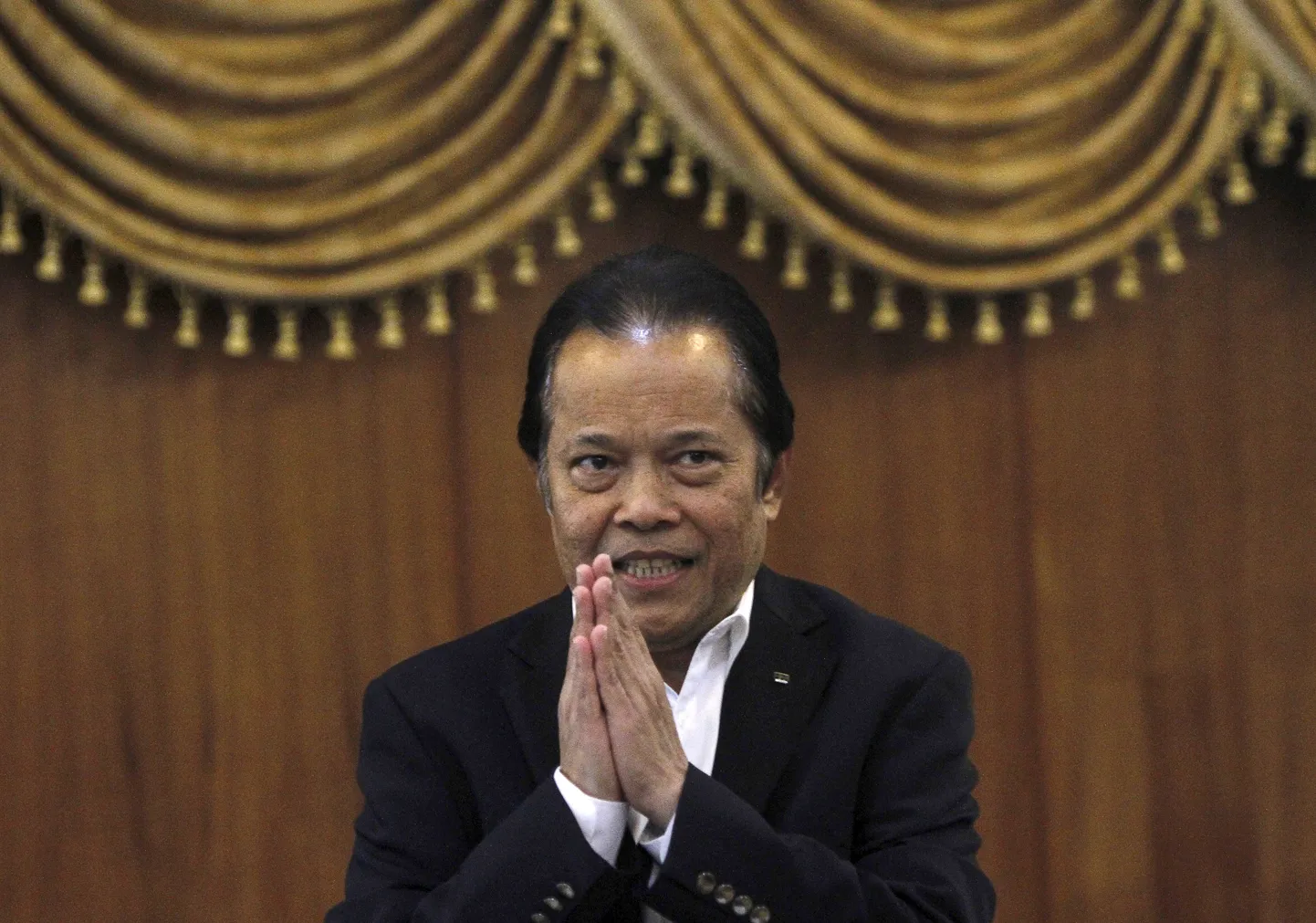 Then Football Association of Thailand (FAT) President Worawi Makudi gestures after a news conference at the association office in Bangkok in this September 19, 2012 file photo. Former FIFA executive committee member Worawi has been suspended for 90 days pending a full investigation, the Ethics Committee of soccer's governing body said on October 12, 2015.   REUTERS/Chaiwat Subprasom/Files