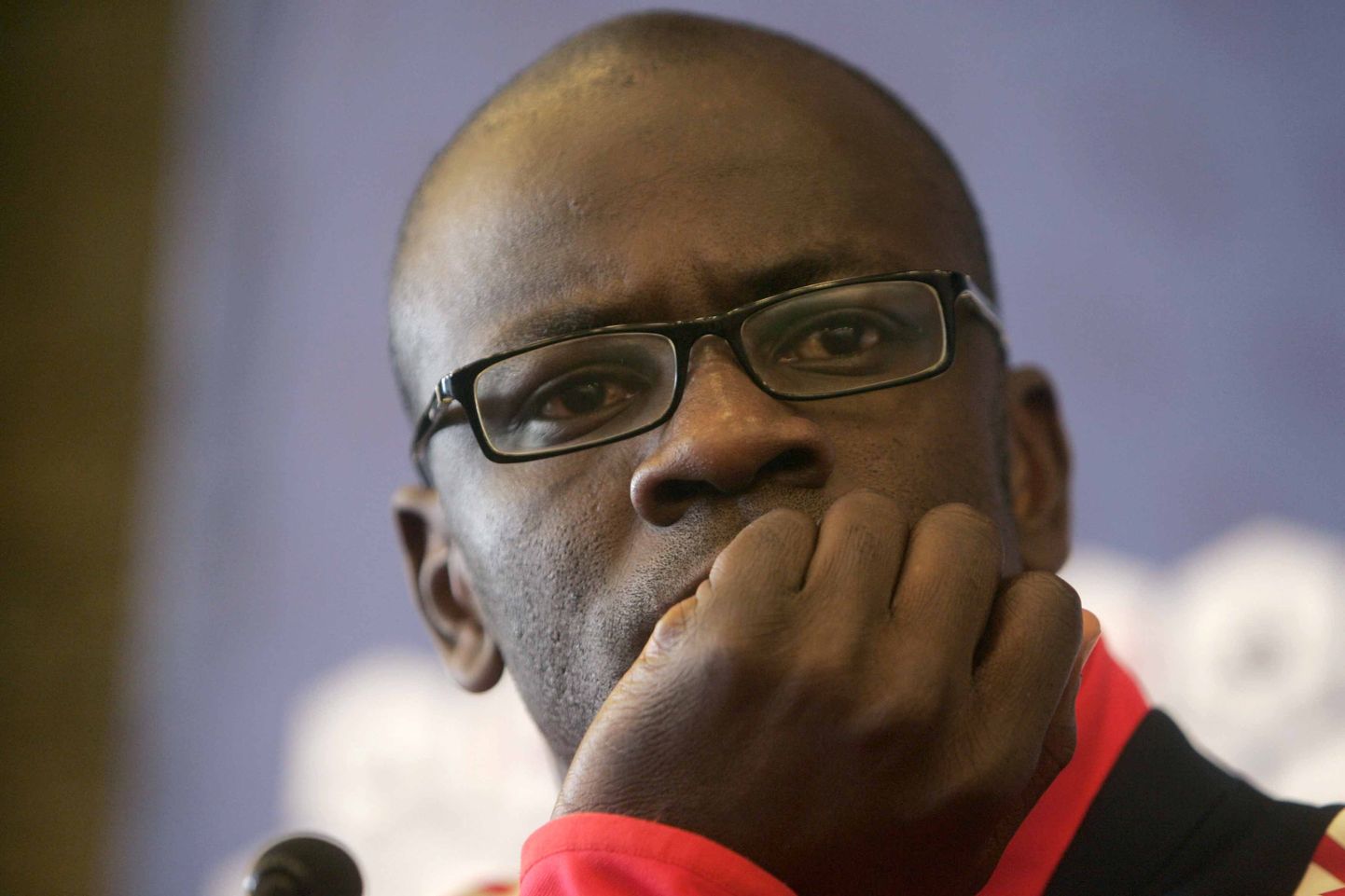 French soccer player Lilian Thuram, looks on,  during a press conference in the Alpine resort of Tignes Monday, May 26, 2008. France coach Raymond Domenech selected 30 players for a pre-tournament camp in the Alpine ski resort of Tignes, where he will cut seven players for his final 23-man squad for Euro 2008 in Austria and Switzerland on May 28. (AP Photo/Michel Euler) / SCANPIX Code: 436