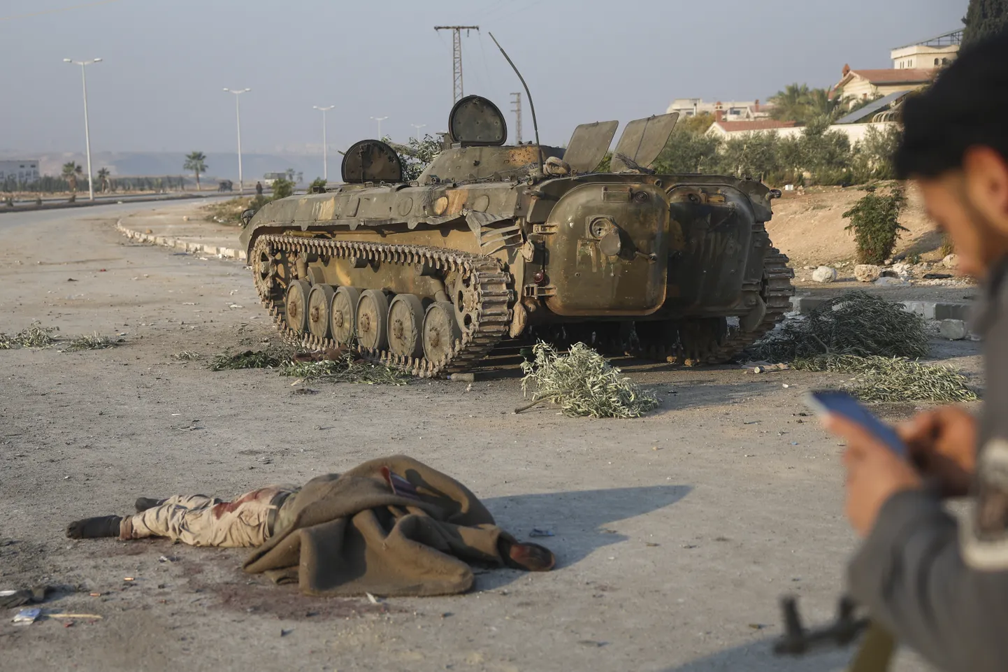 Karavīra līķis Sīrijā šī gada decembra sākumā, kad nemiernieki ieņēma Hamas pilsētu.