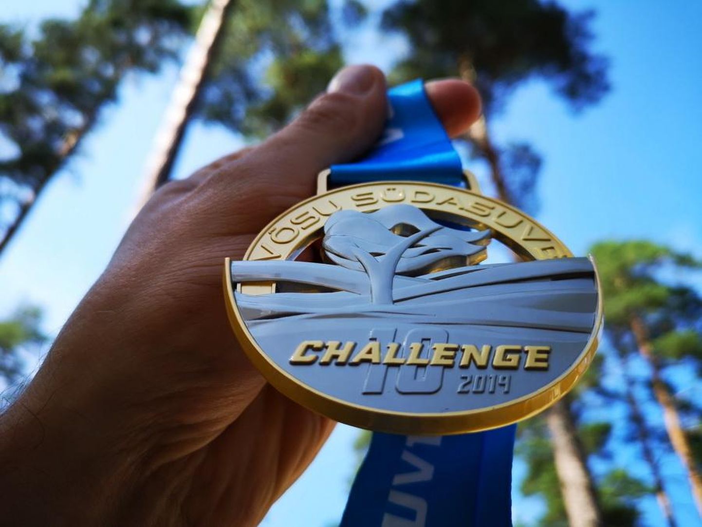 Võsu Südasuve Challenge&#39;i 10 kilomeetri pikkuse distantsi medal.