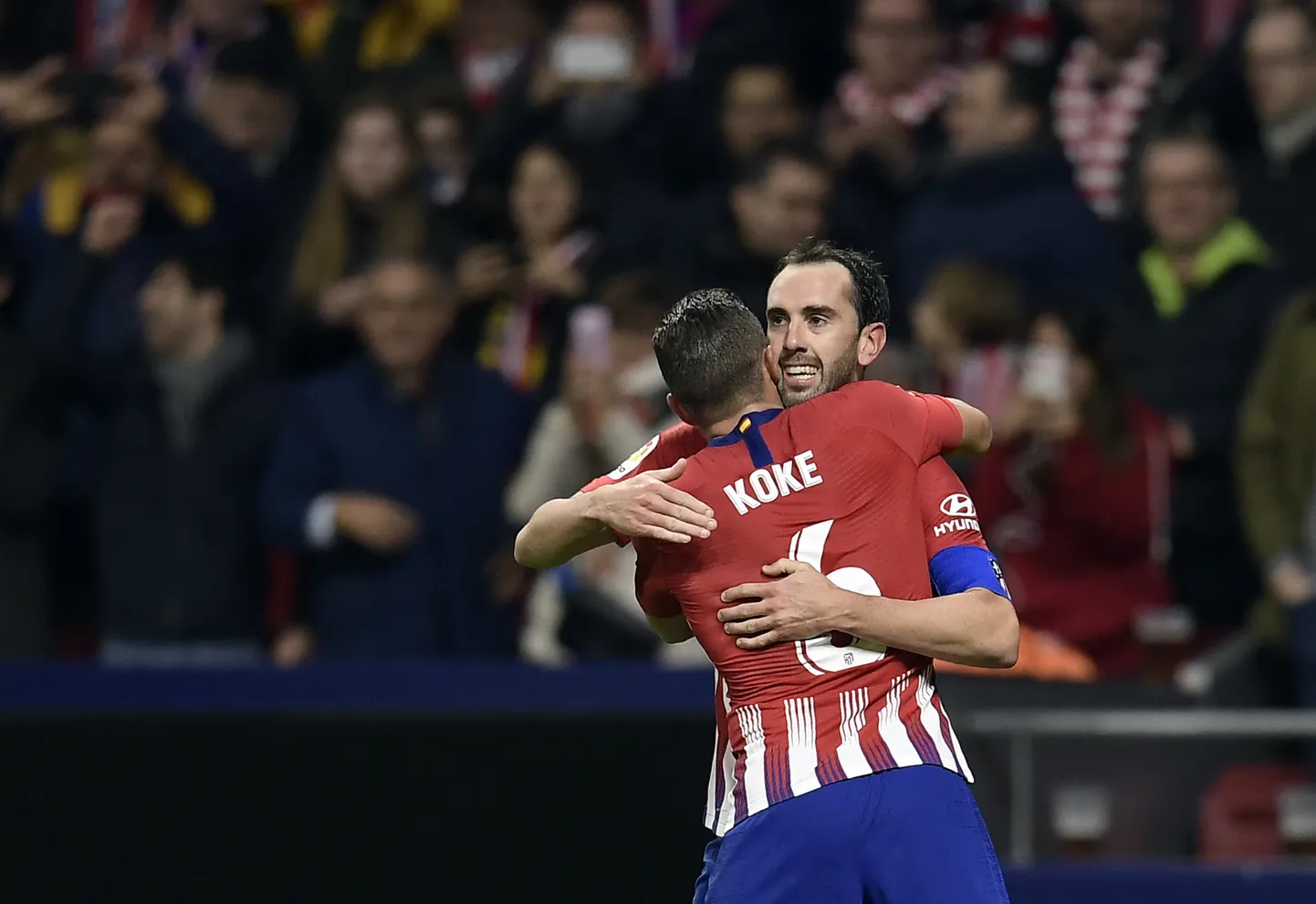 Koke ja Diego Godin.