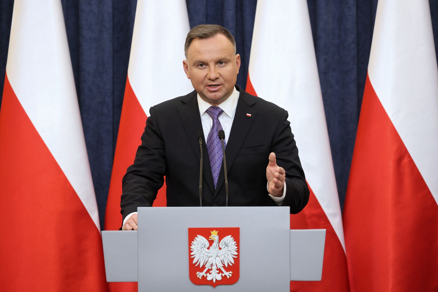 epa09759690 Polish President Andrzej Duda speaks during a press conference at the Presidential Palace in Warsaw, Poland, 15 February 2022. The Polish president met with cabinet ministers on the day to discuss potential developments in case Russia will decide to escalate its conflict with Ukraine. 'We have discussed the situation because we need to assume different scenarios and we've just discussed those different scenarios of what may happen in Ukraine, around Ukraine and of course in Belarus, which now hosts Russian military forces', Duda said. The discussion also covered the problem of potential refugees from Ukraine in the event of a military conflict.  EPA/LESZEK SZYMANSKI POLAND OUT