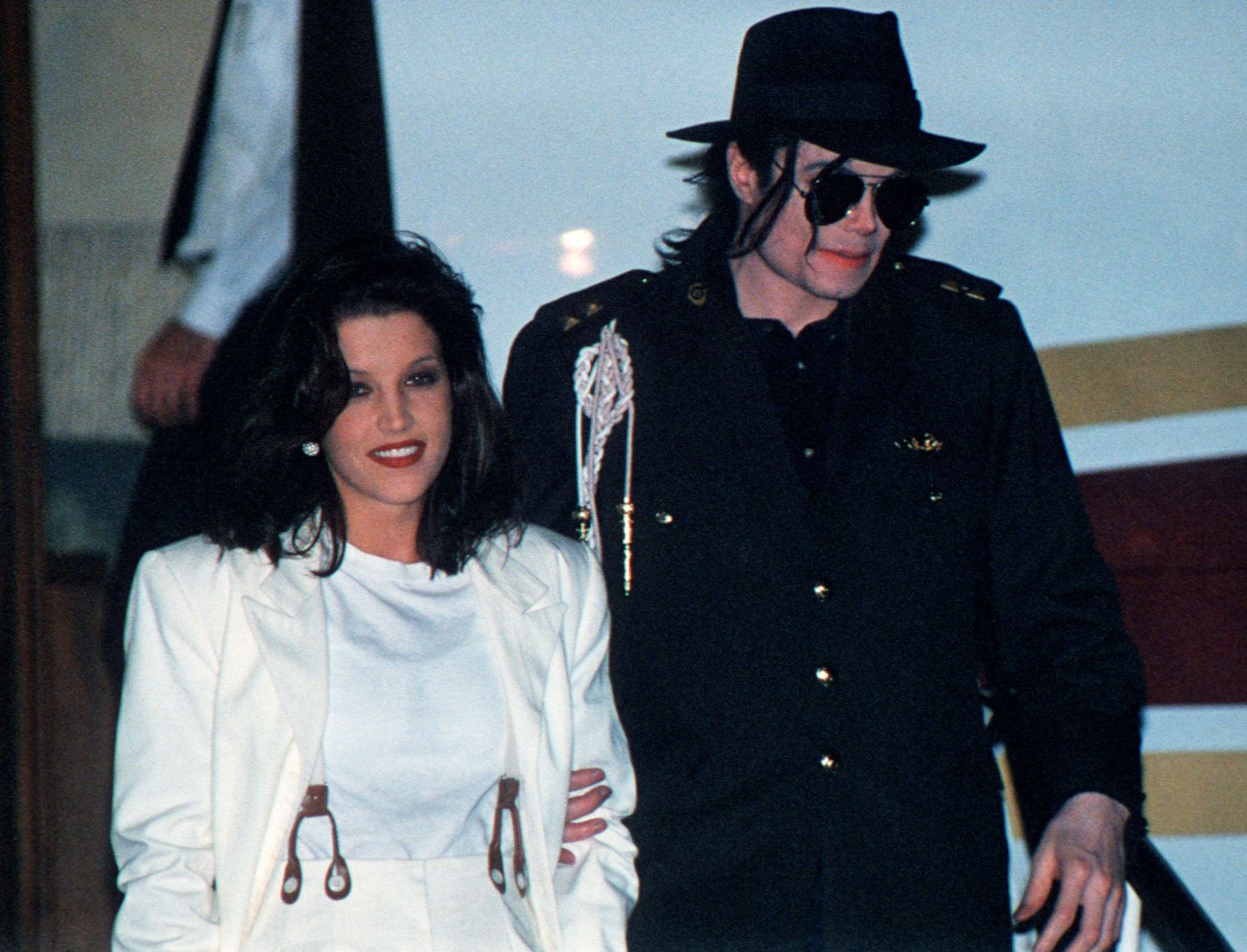 Майкл Джексон с женой.