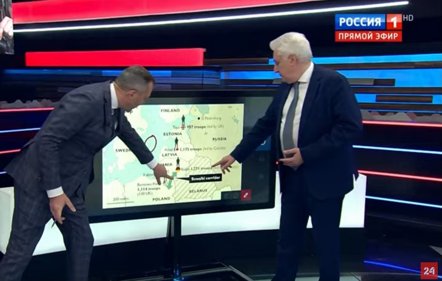 Igor Korotšenko (paremal) kirjeldas telekanali Rossija 1 saates «60 minutit» iroonilises võtmes stsenaariumi, kuidas Venemaa vallutab Balti riigid.