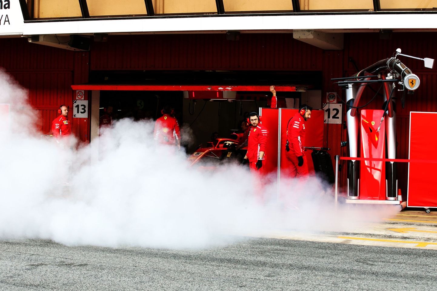 Sebastian Vettel (GER) Ferrari SF71H with smoke coming from a pipe at the side of the pit garage.
08.03.2018. Formula One Testing, Day Three, Barcelona, Spain. Thursday.
Photo credit should read: XPB/Press Association Images.