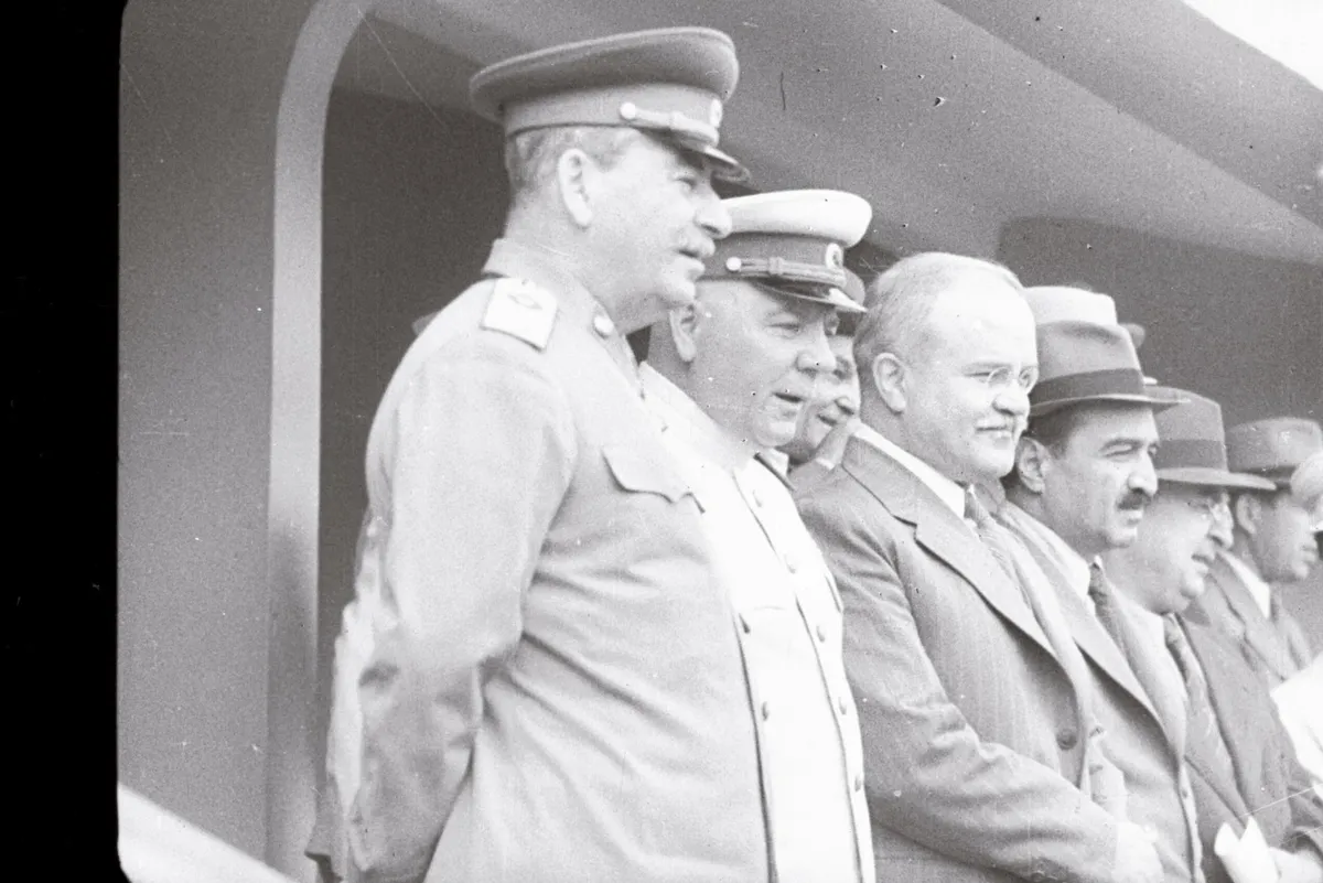 Monsters' Ball: Watching the athletes' parade in Moscow in 1947 are (from left) Joseph Stalin, Kliment Voroshilov, Vyacheslav Molotov, Anastas Mikoyan, and Lavrentiy Beria.