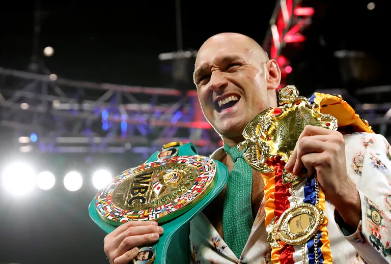 Tyson Fury WBC raskekaalu meistrivööga.  