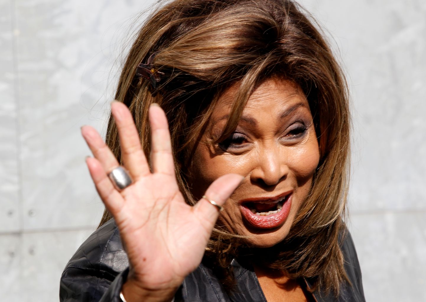 FILE PHOTO: U.S. singer Tina Turner waves during a photocall before the Emporio Armani Autumn/Winter 2011 women's collection show at Milan Fashion Week February 26, 2011.  REUTERS/Stefano Rellandini/File Photo