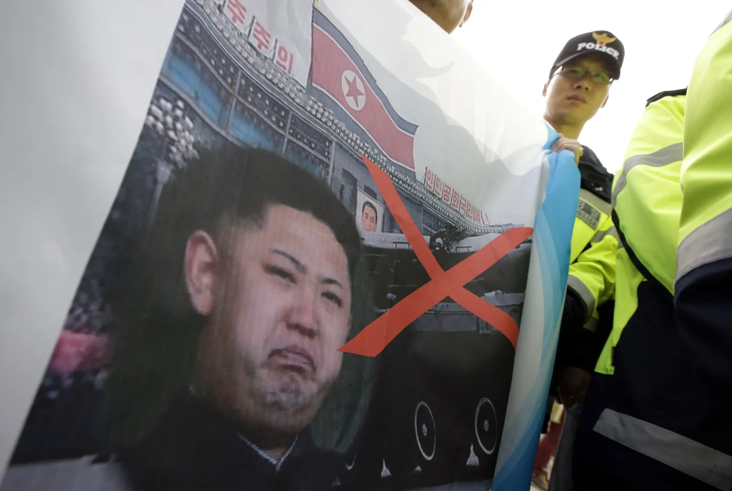 Põhja-Korea diktaatorit Kim Jong-uni pilav plakat.