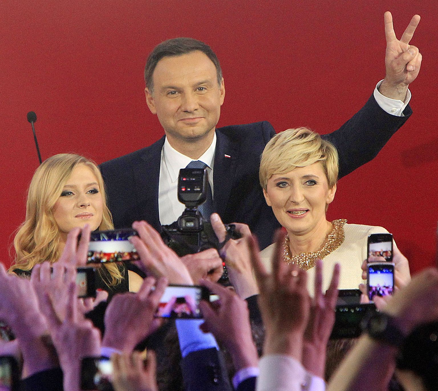 Poola presidendiks saav Andrzej Duda koos tütre Kinga (vasakul) ja abikaasa Agataga.
