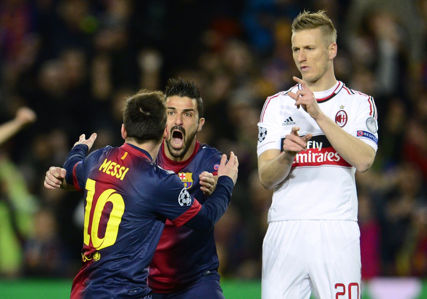 Lionel Messi ja David Villa tähistavad Messi väravat AC Milani vastu.