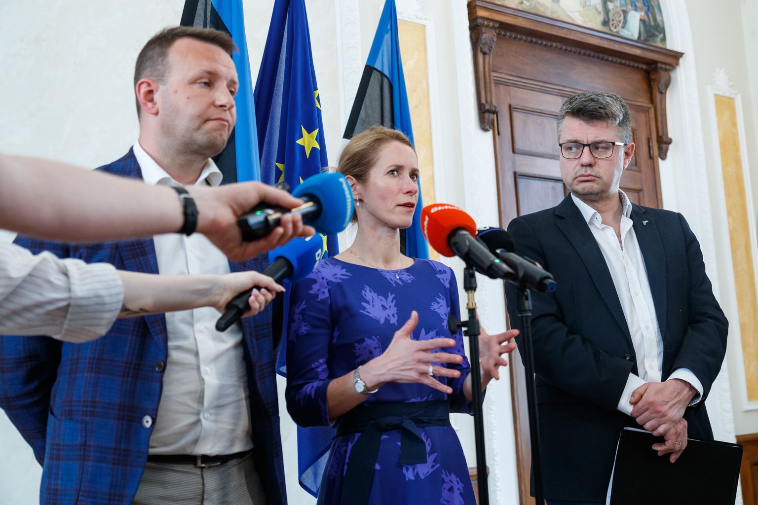 Представители трех эстонских партий, договаривающихся о правящей коалиции.
