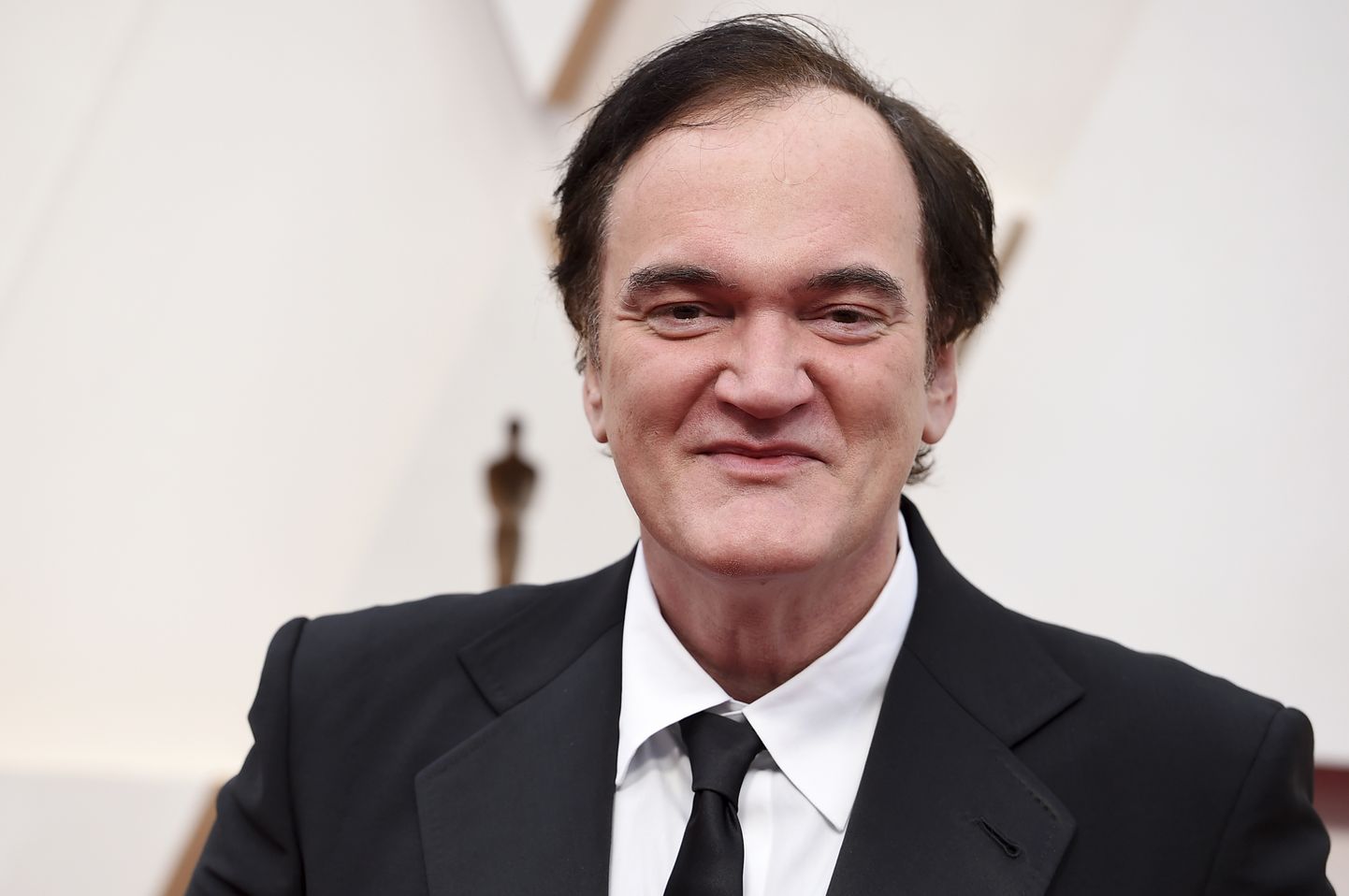 Kventins Tarantino 92. "Oskaru" pasniegšanas ceremonijā.