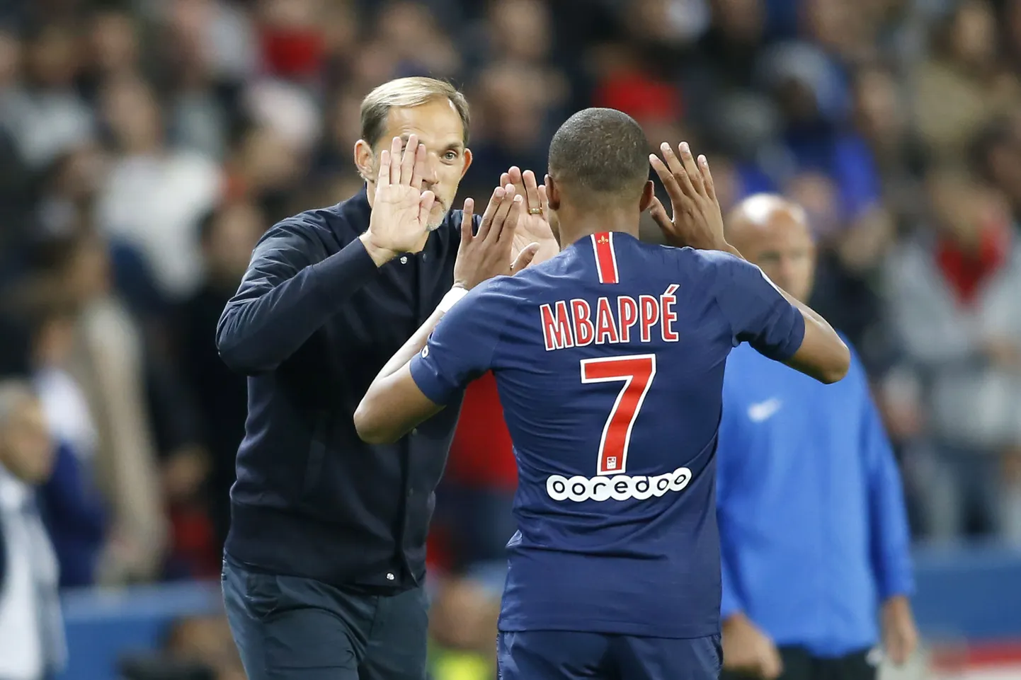 PSG peatreener Thomas Tuchel ja ründaja Kylian Mbappe.