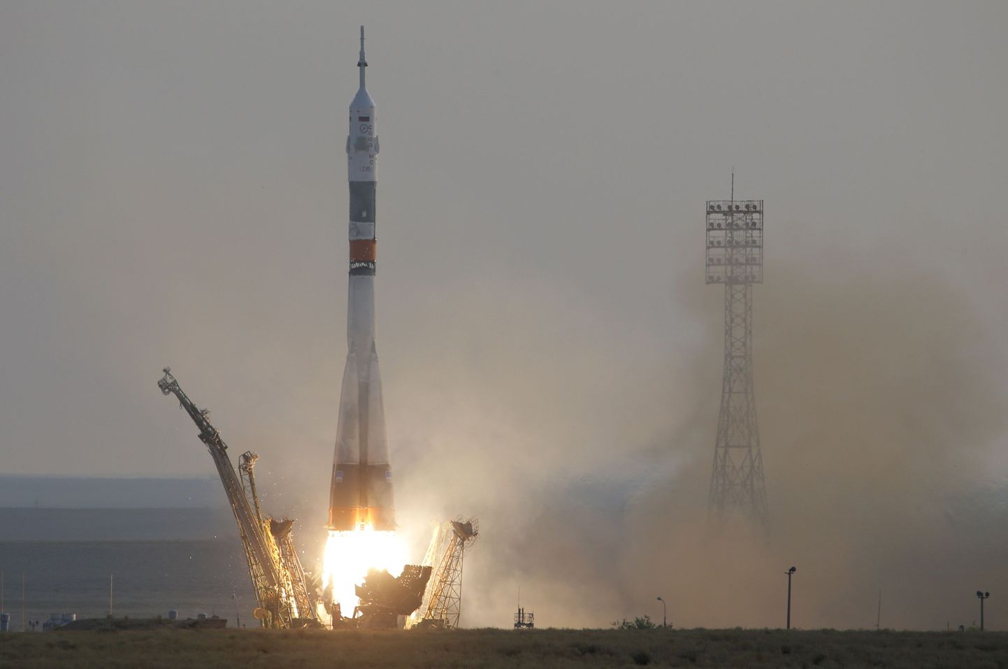 The Soyuz-FG rocket booster with Soyuz MS space ship carrying a new crew to the International Space Station, ISS, blasts off at the Russian leased Baikonur cosmodrome, Kazakhstan, Thursday, July 7, 2016. The Russian rocket carried U.S. astronaut Kate Rubins, Russian cosmonaut Anatoly Ivanishin, and Japanese astronaut Takuya Onishi. (AP Photo/Dmitri Lovetsky)