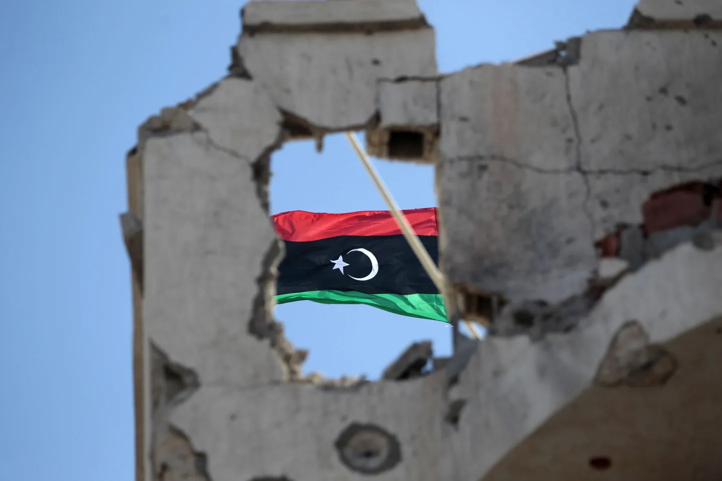 Liibüa kuningriigi lipp, mille Gaddafi vastu üles tõusnud liibüalased võtsid taas kasutusele veebruaris 2011.