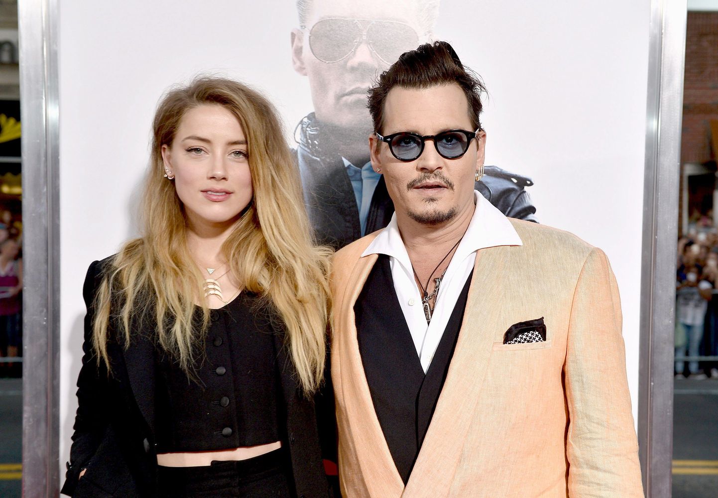 BOSTON, MA - SEPTEMBER 15: Actors Amber Heard (L) and Johnny Depp attend the "Black Mass" Boston special screening at the Coolidge Corner Theatre on September 15, 2015 in Boston, Massachusetts.   Paul Marotta/Getty Images for Warner Brothers/AFP
== FOR NEWSPAPERS, INTERNET, TELCOS & TELEVISION USE ONLY ==