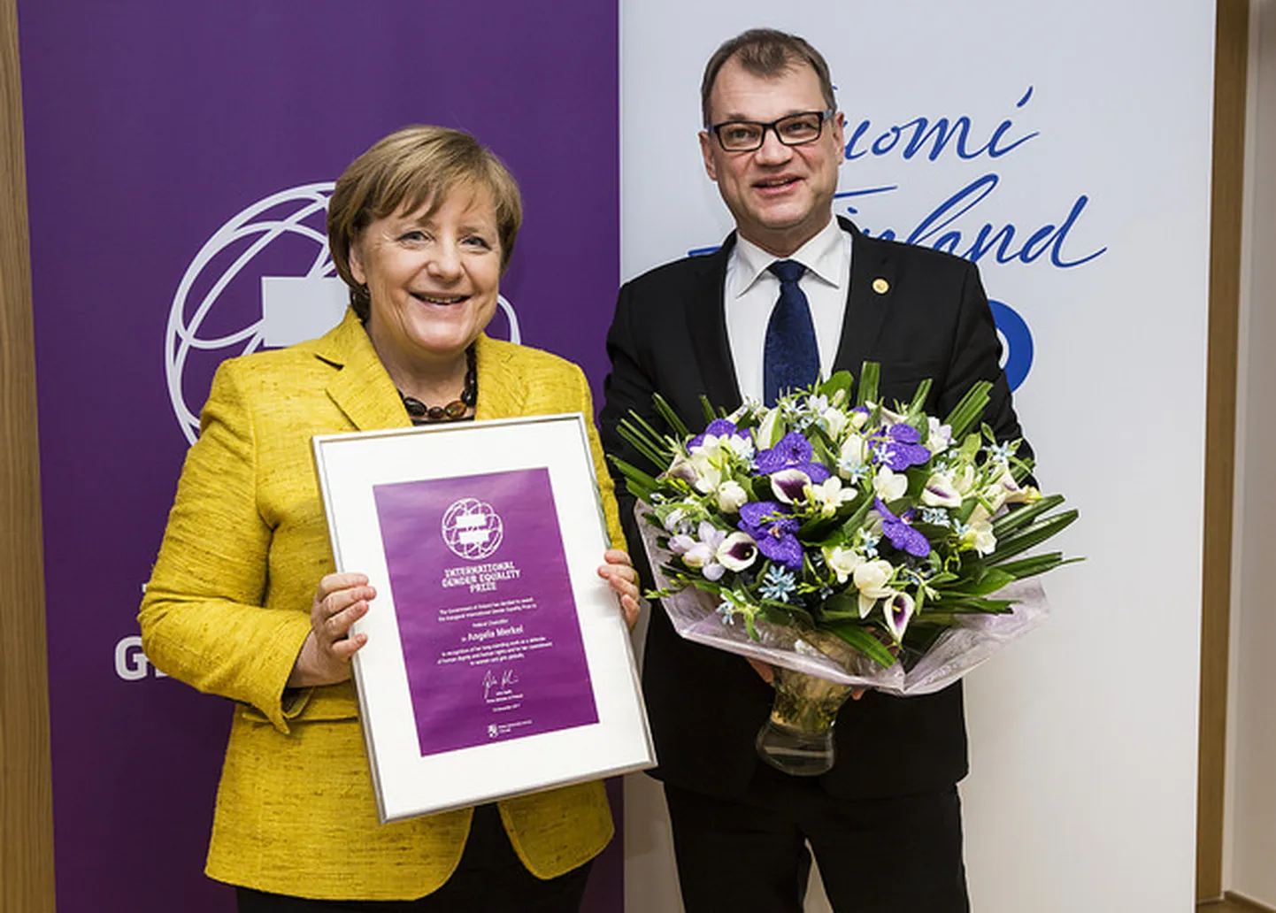 Juha Sipila ja Angela Merkel.