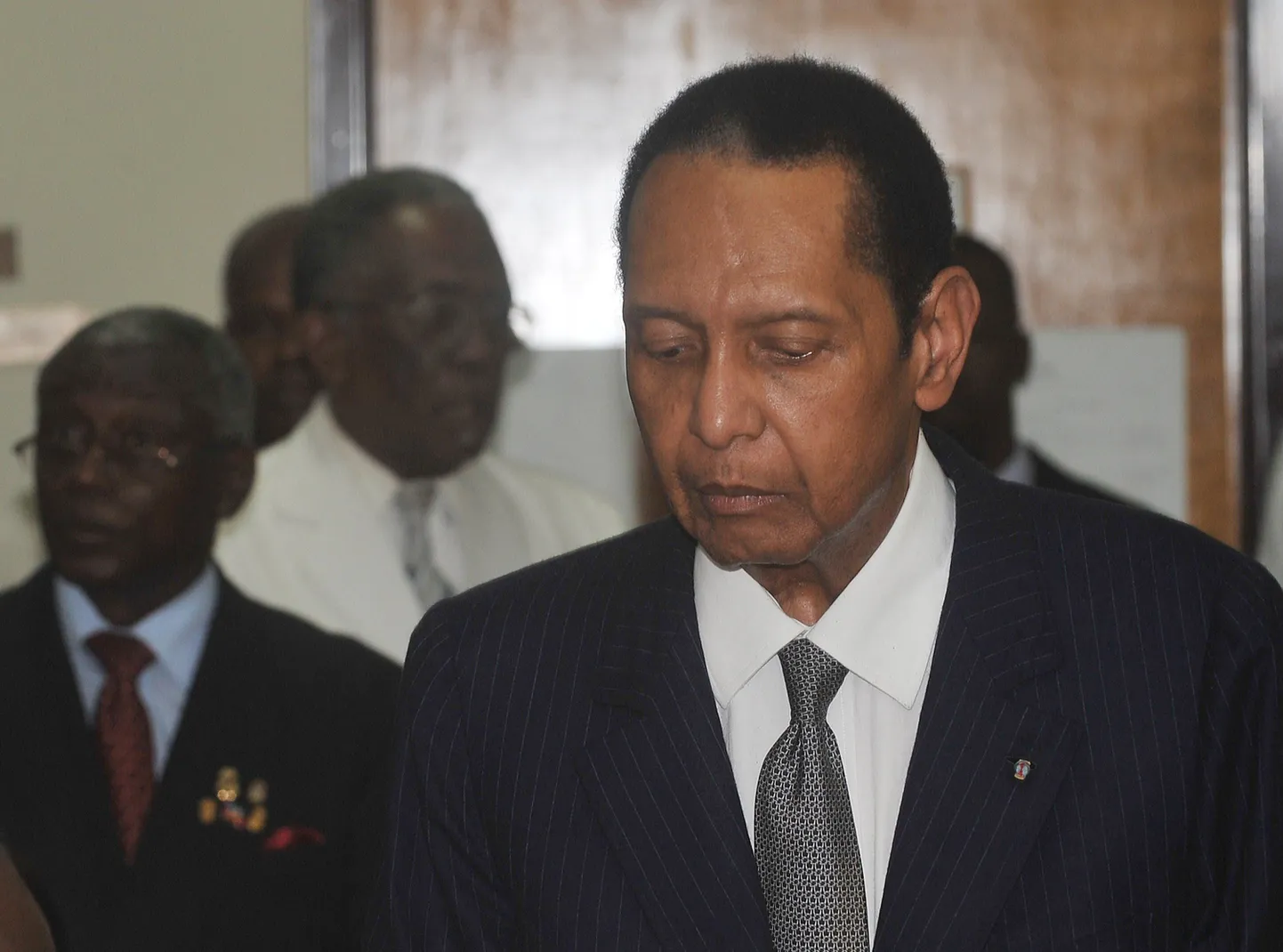 Haiti diktaator aastail 1971–1986 Jean-Claude «Baby Doc» Duvalier 28. veebruaril 2013 Port-au-Prince'is kohtusse sisenemas.