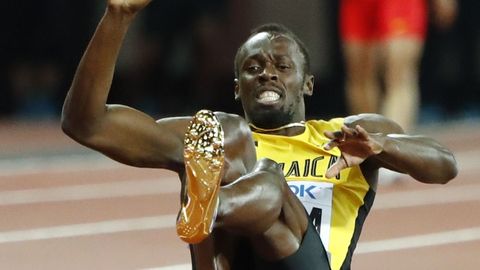 Фото: травма Болта не позволила ямайскому квартету финишировать в эстафете 4х100 метров