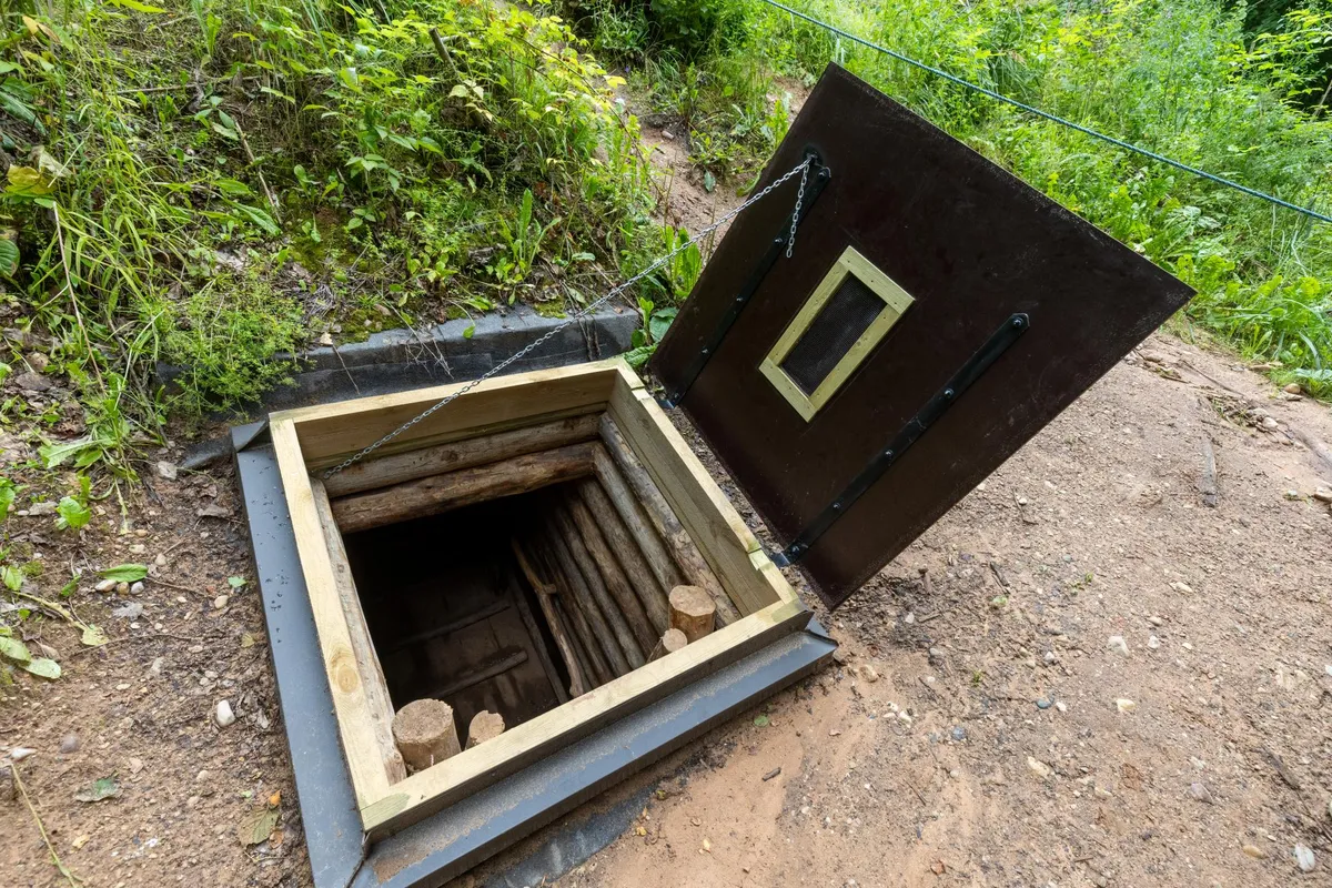 When building military defensive infrastructure for infantry, the Baltic States draw from their experience during and after WWII, when up to 70,000 Baltic partisans, the so-called Forest Brothers, fought against the Soviet occupation. The photo shows a bunker used by Estonian Forest Brothers from the post-WWII era at Ennuksemäe in Southern Estonia. Today, the bunker is a popular tourist destination.