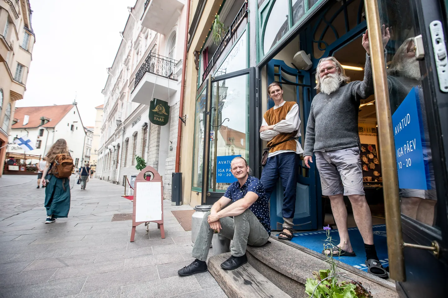 Owners of the gift shop on Viru street in Tallinn old town.