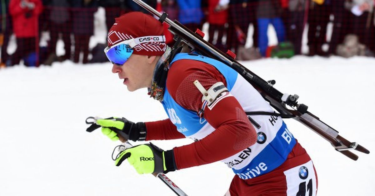 Latvian biathletes are overtaken for a lap in the mixed relay of the