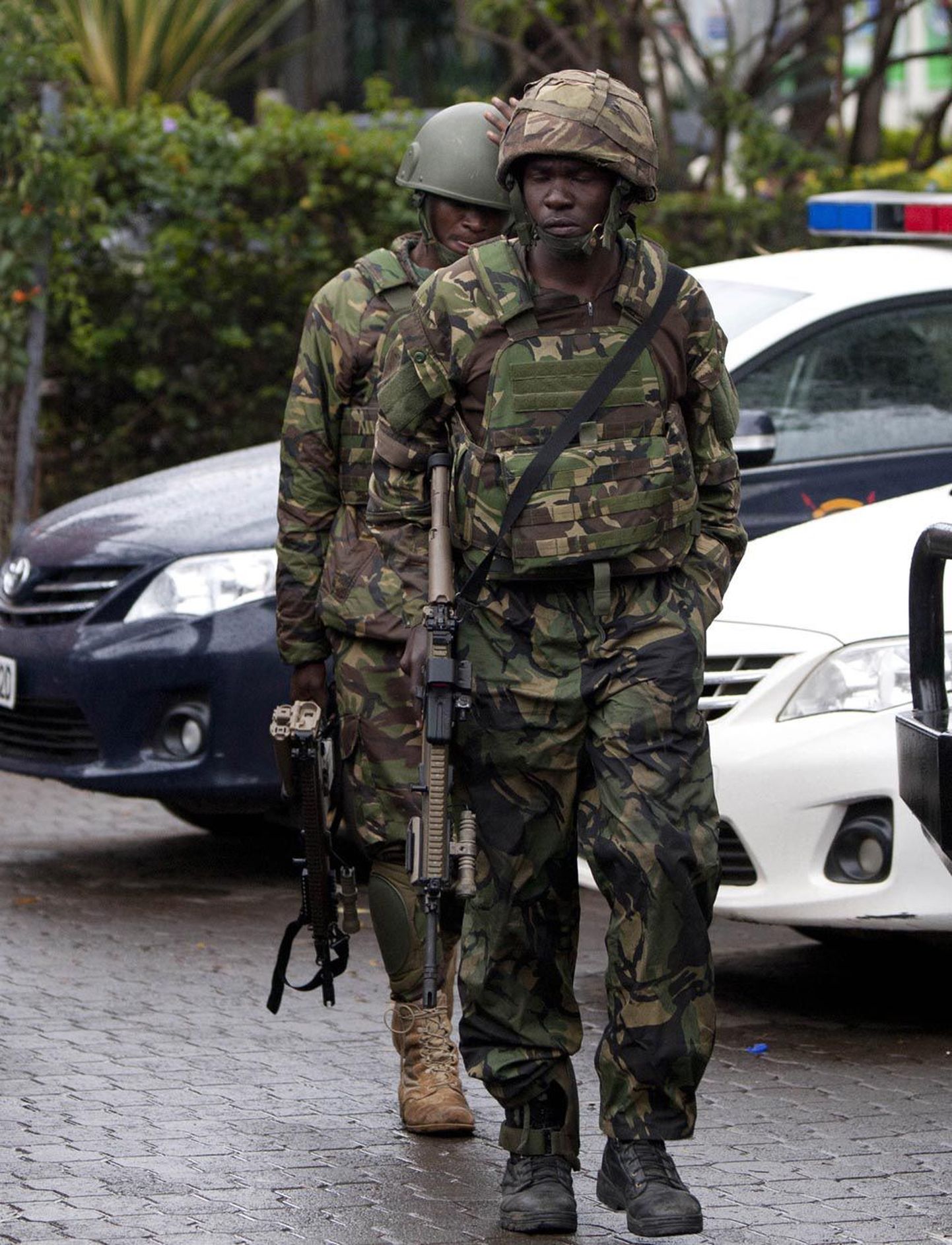 Väsinud Keenia sõdurid naasid pärast sõjalise operatsiooni lõppenuks kuulutamist baasidesse.