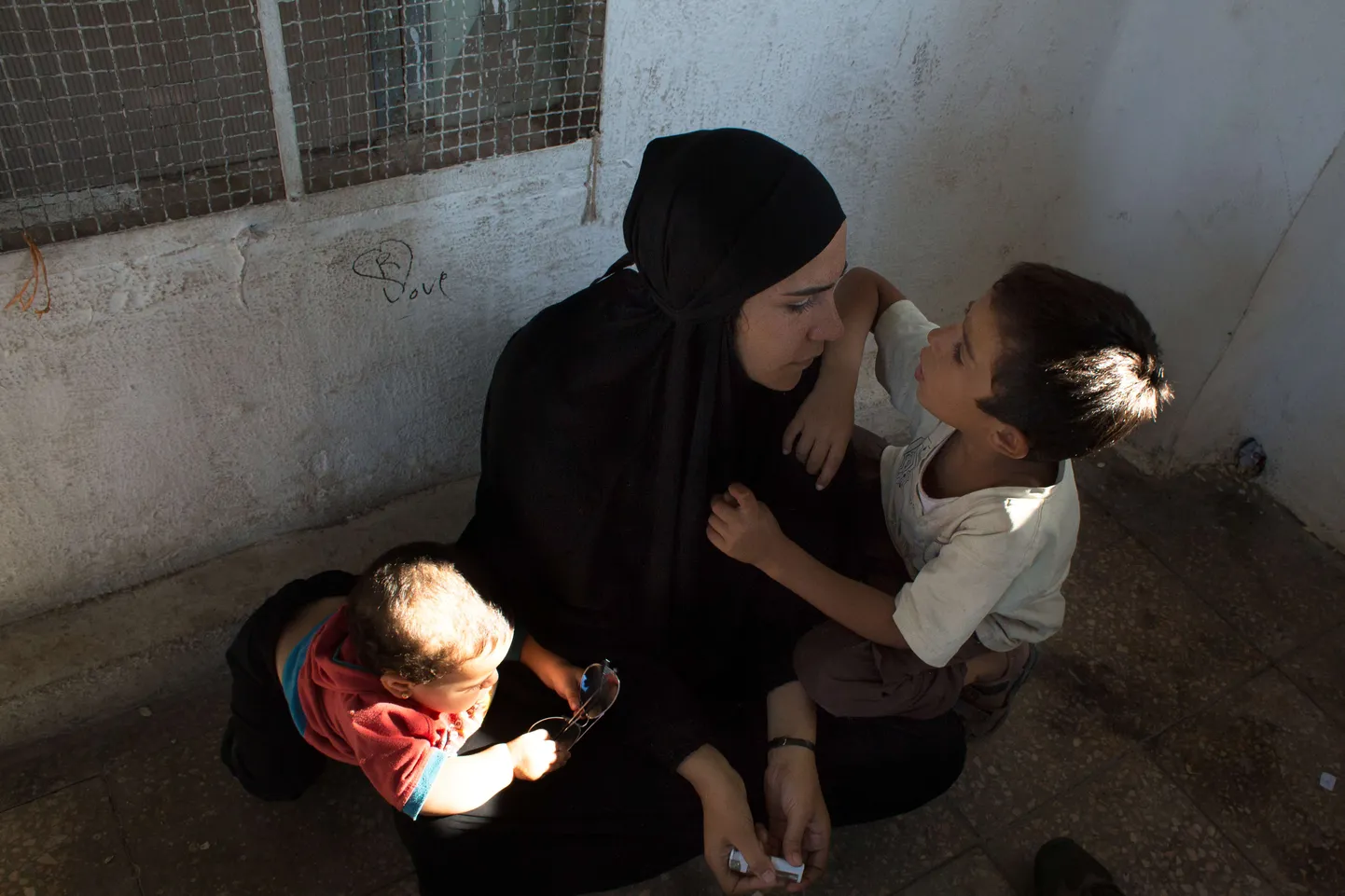 Islamiriigi äärmuslase naine lastega.